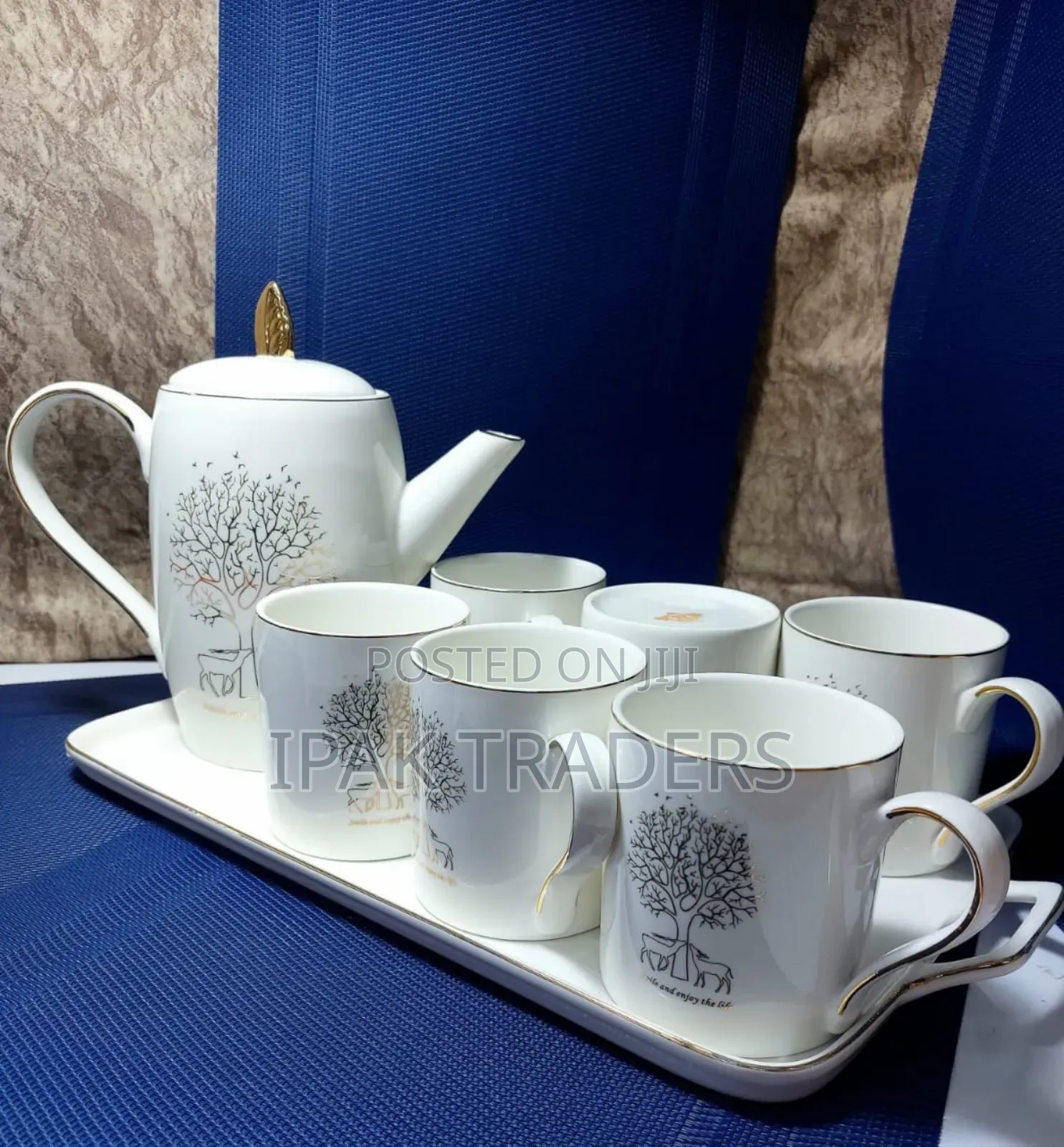 Tea Sets 
1 Pot 
6 Cups
In Box