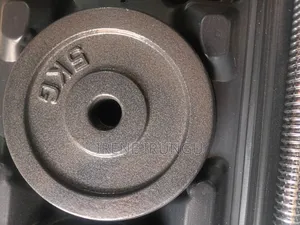 Two Pieces of 5kg Weight Plates++ Cast Iron