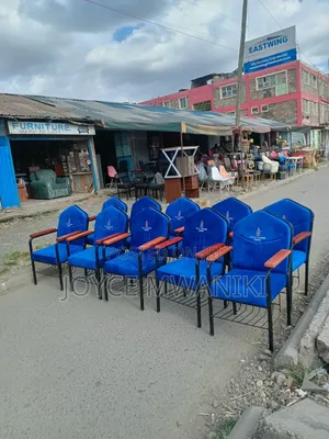 Church Branded Chairs With Varnished Wooden Armrest