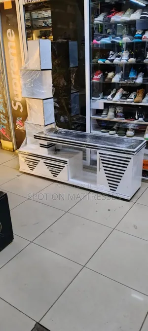 Tv Stand With Side Decor Shelves and Drawers + Free Home Delivery.