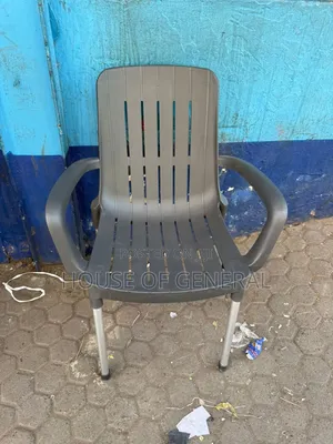 Gray Plastic Chair With Metal Legs. Strong and Durable Plastic Chairs