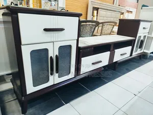 Superb Tv Stand With Extendable Sides and Neatly Done Drawers.