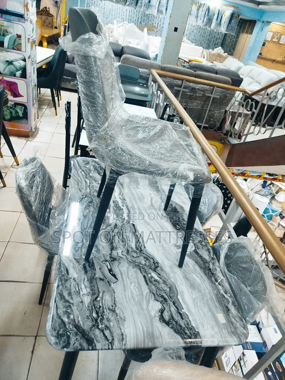 Imported Dining Set With Marble Top Table and 4 Leather Chairs.