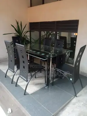 Executive 6 Sitter Glass Dinning Table  With Leather Seat