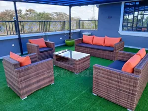 Beautiful 7 Seater Outdoor Set Plus a Table (Has Cushions)