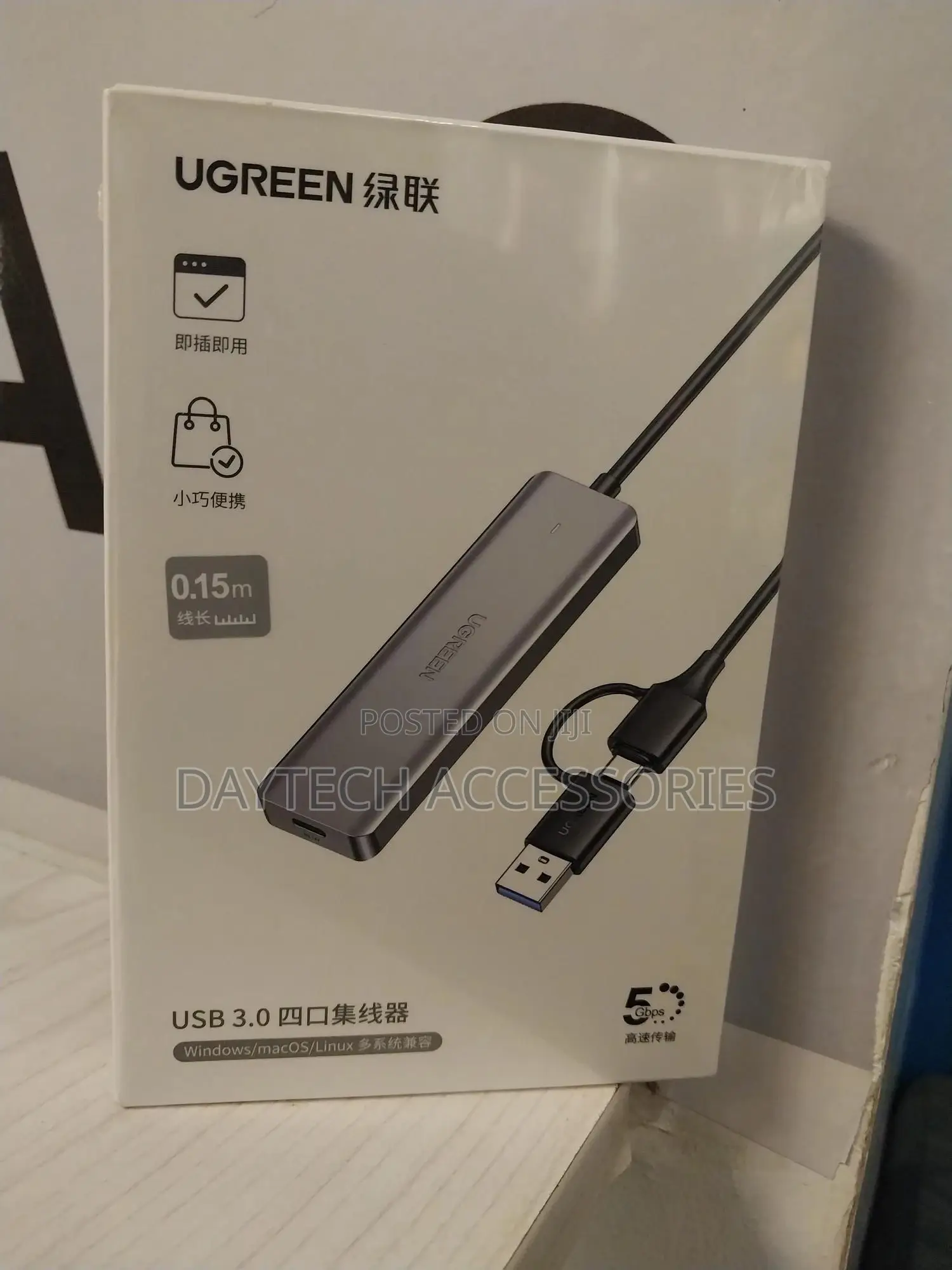 A Ugreen 2 in 1 Usb 3.0/Type-C 4-Port Hub Adapter (Model Cr113).