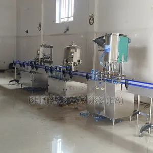 Automatic Filling Machine - Precision Bottling For Beverages