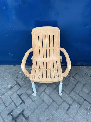 Brown Acme Plastic Chair With Metal Legs. Good Quality Plastic Chair