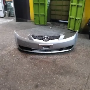 Mazda Demio Model 2005/2006 Front Bumper Complete With Grille