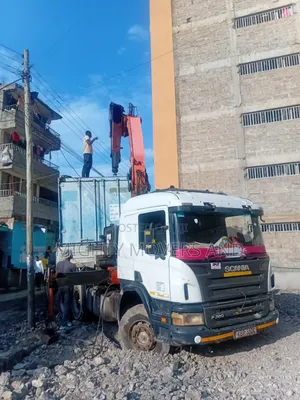 Trailers With Cranes Accessible for Hoisting and Logistics Errands
