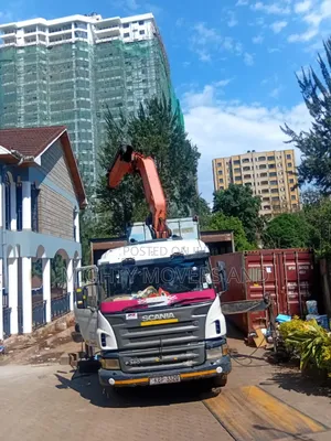 Flatbed Trailers With Cranes Are at Hand for Logistics