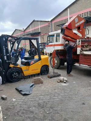 Trailer With Crane Ready for Delivery of Goods