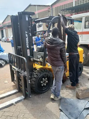 Flatbed Trailer With Crane Are Ready for Transportation