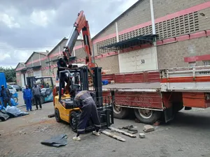 Flatbed Trailer With Crane Are Ready for Transportation