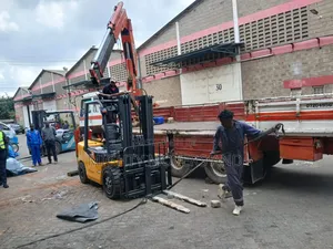 Flatbed Trailer With Crane Are Ready for Transportation