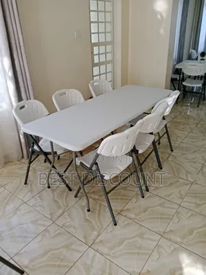 White 6 - Chairs Rectangle Foldable Chairs and Table.
