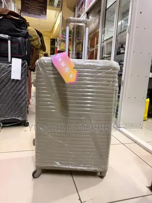 Large Size Rubber Suitcase 25kgs(66cm Height)At 4000 in Color.Brown