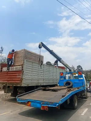 Flatbed Trailer With Crane Are at Hand for Cross Country Delivery