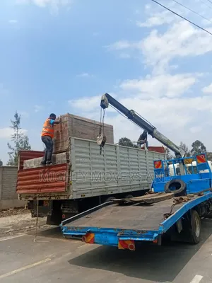 Trailer With Crane Are Ready for Hoisting and Cross Country Delivery
