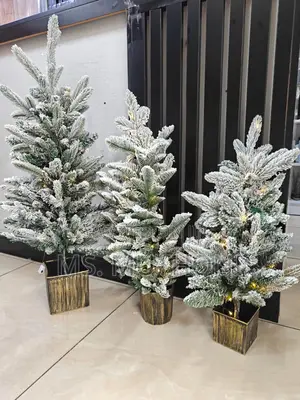 A Set of 3 Pre Lit Mini Christmas Trees*