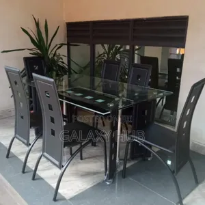 Executive 6 Sitter Glass Dinning Table With Leather Seat