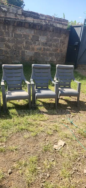 Gray Plastic Chairs With Slanting Backrest
