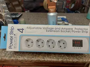 Adjustable Voltage Ampere Protector Extension Socket With Four Outlets