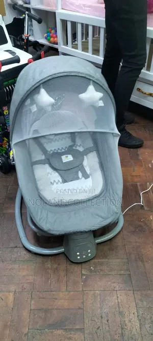 Electric Baby Swing * Electric Baby Swing