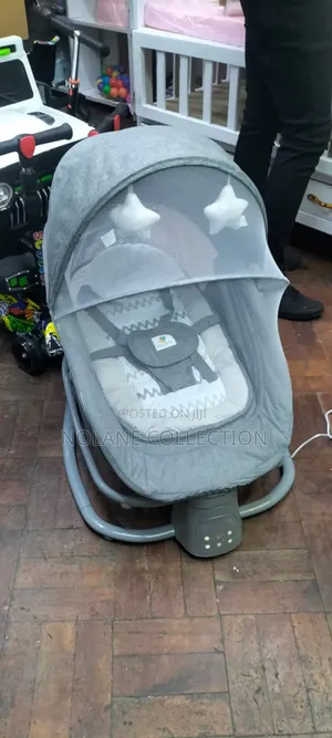 Electric Baby Swing * Electric Baby Swing