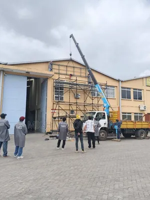 Mguu Kumi Trucks With Hoisting Cranes Are Available