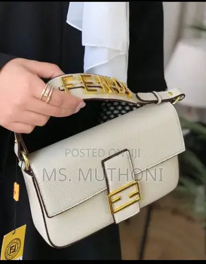 Fendi Medium Baguette Bag With Gold Hardware.