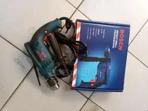 Bosch Drill. Electric Bosch Drill 910 Watts