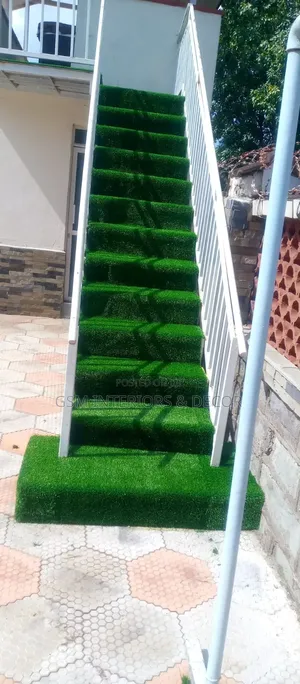 Green Grass Carpets on Ascending Stairs