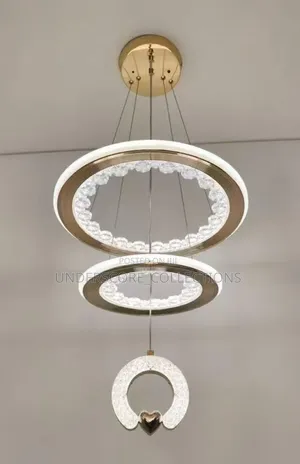 Modern Led Crystal Ring Chandelier With a Gold Finish.