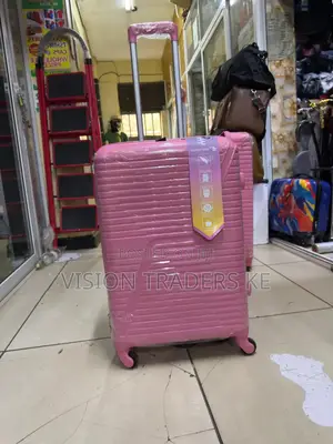 Pink Medium Size Rubber Suitcases 
Height 60cm