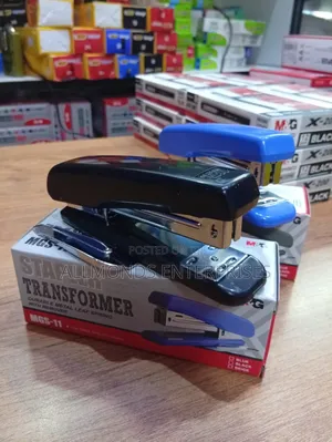 A Piece of Metallic M G Stapler With Staple Remover Leaf