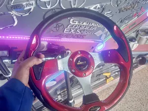 Steering Red/Black Universal In All Vehicles.
