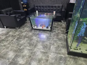Artistic Glass Aquarium Table - 25,000 Kes