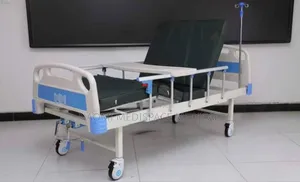 Double Crank Hospital Bed Complete With Matress and Mackintosh