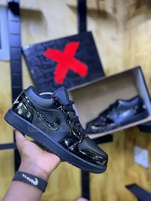 Nike Air Jordan 1 Low Se "Patent Elephant Black" Sneaker.