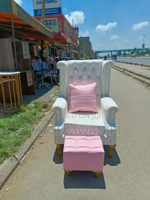 Pedicure Seat, White Leather and a Pink Pouf