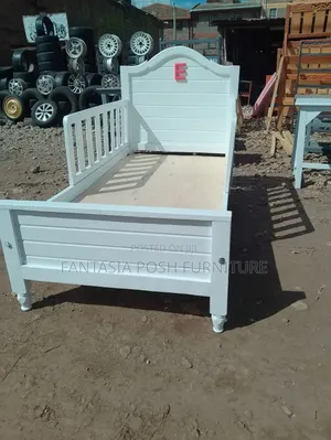 Elegant White Wooden Kids Bed With Side Safety Rail