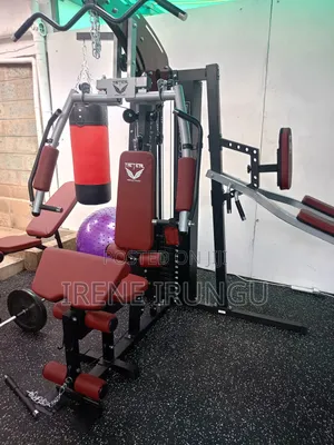 4 Station Multi Gym Machine With a Punching Bag