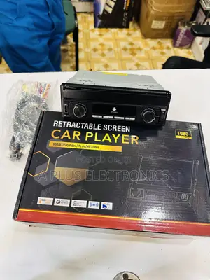 Single-Din Car 7 Inch Media Player With a Retractable Touchscreen.