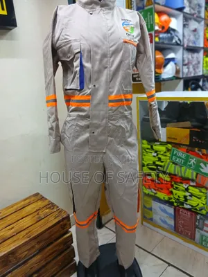 Beige Coveralls Reflective With Pockets That Allow Tools Small Items