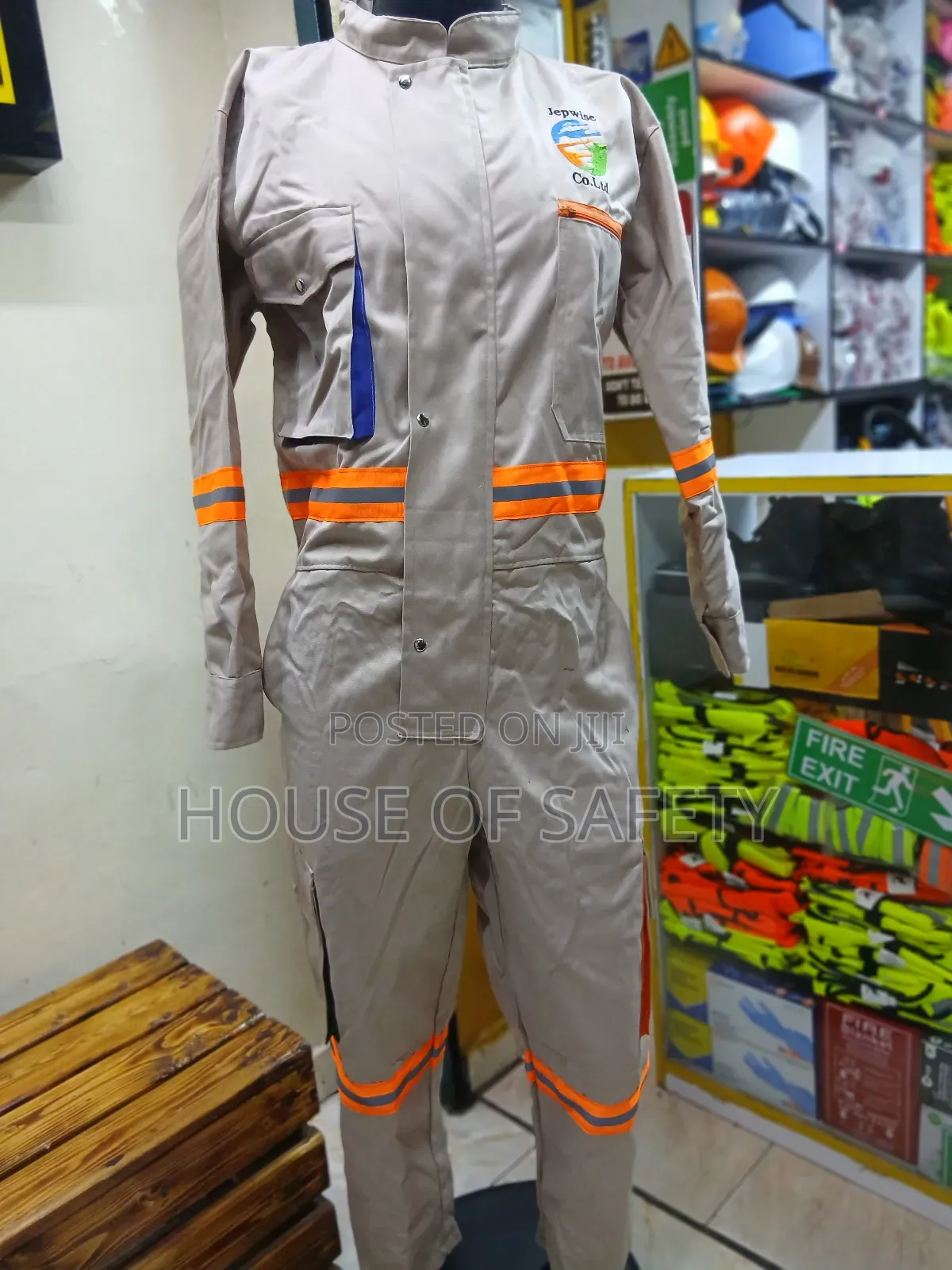 Beige Coveralls Reflective With Pockets That Allow Tools Small Items