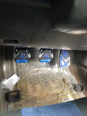 Manual Car Pedals Fitted With Blue Black Nonslip Covers