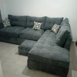 L-shaped Sofa With A Puff