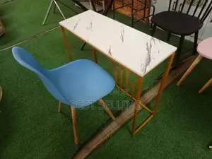 Coffee Table and Eams Chair