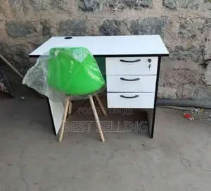 White Office Desk and Green Eames Chair